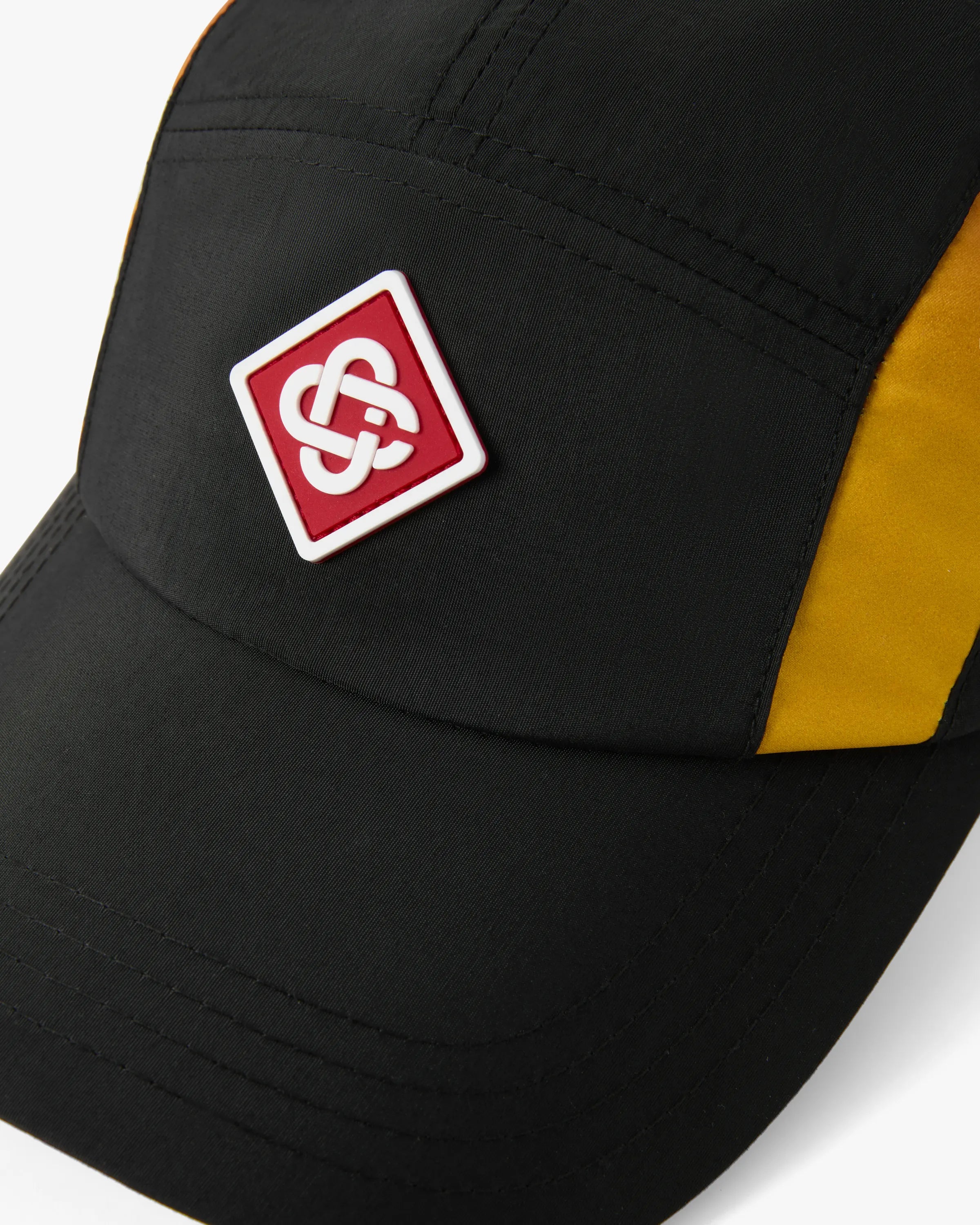Casquette en nylon à dégradé noir et orange
