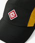 Casquette en nylon à dégradé noir et orange