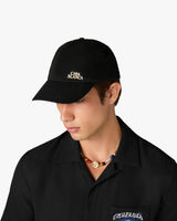 Casquette noire à rivet à logo superposé