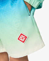 Short de bain bleu et vert pour enfant à motif dégradé