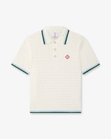Polo à manches courtes blanc en tissu bouclé