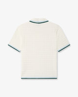 Polo à manches courtes blanc en tissu bouclé