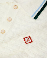 Polo à manches courtes blanc en tissu bouclé