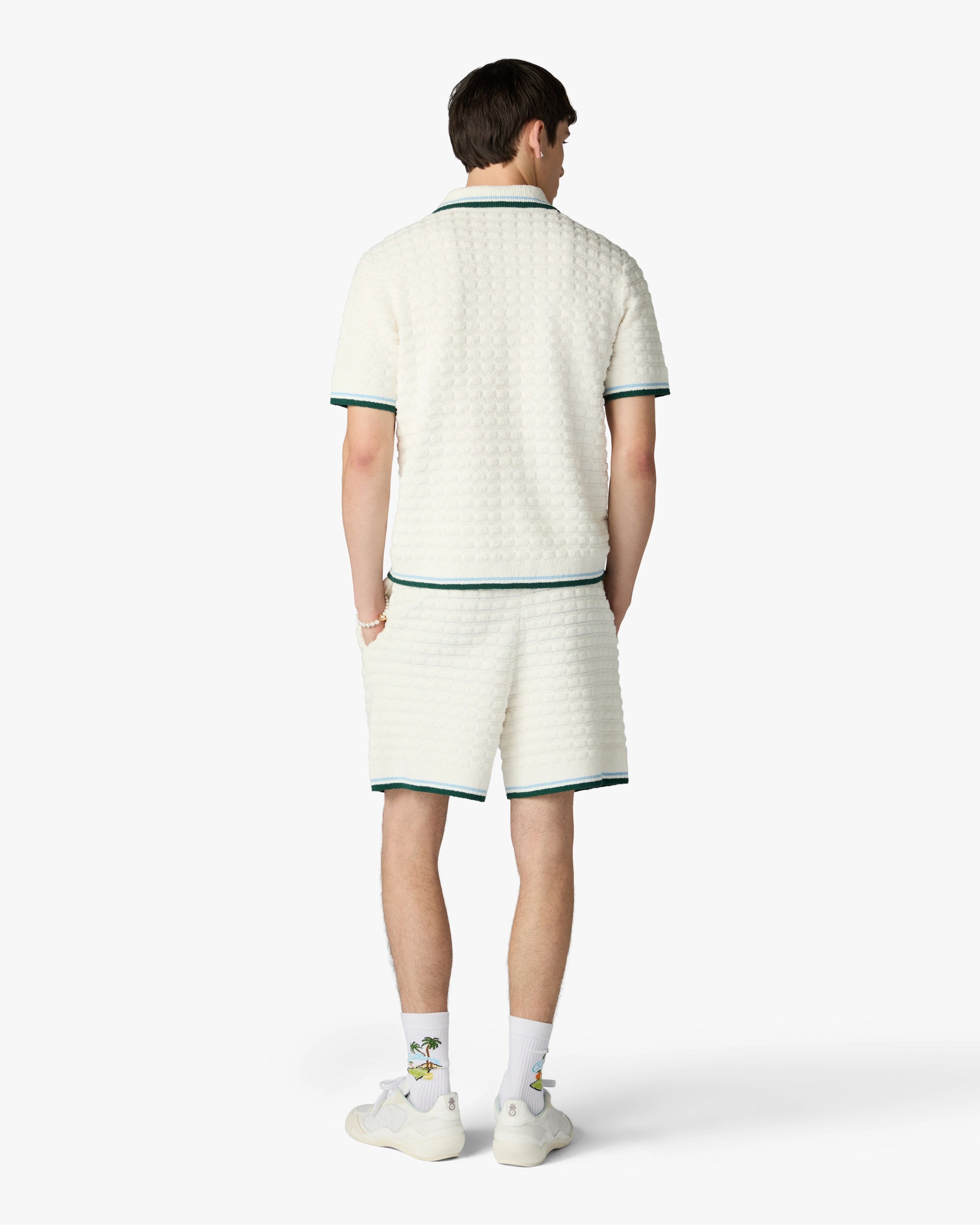 Polo à manches courtes blanc en tissu bouclé