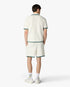 Polo à manches courtes blanc en tissu bouclé