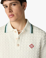 Polo à manches courtes blanc en tissu bouclé