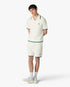 Polo à manches courtes blanc en tissu bouclé