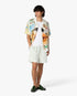 Short sportif vert en lin à rayures et à fleurs