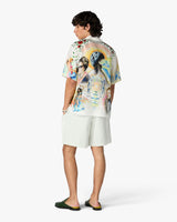 Short sportif vert en lin à rayures et à fleurs