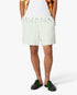Short sportif vert en lin à rayures et à fleurs