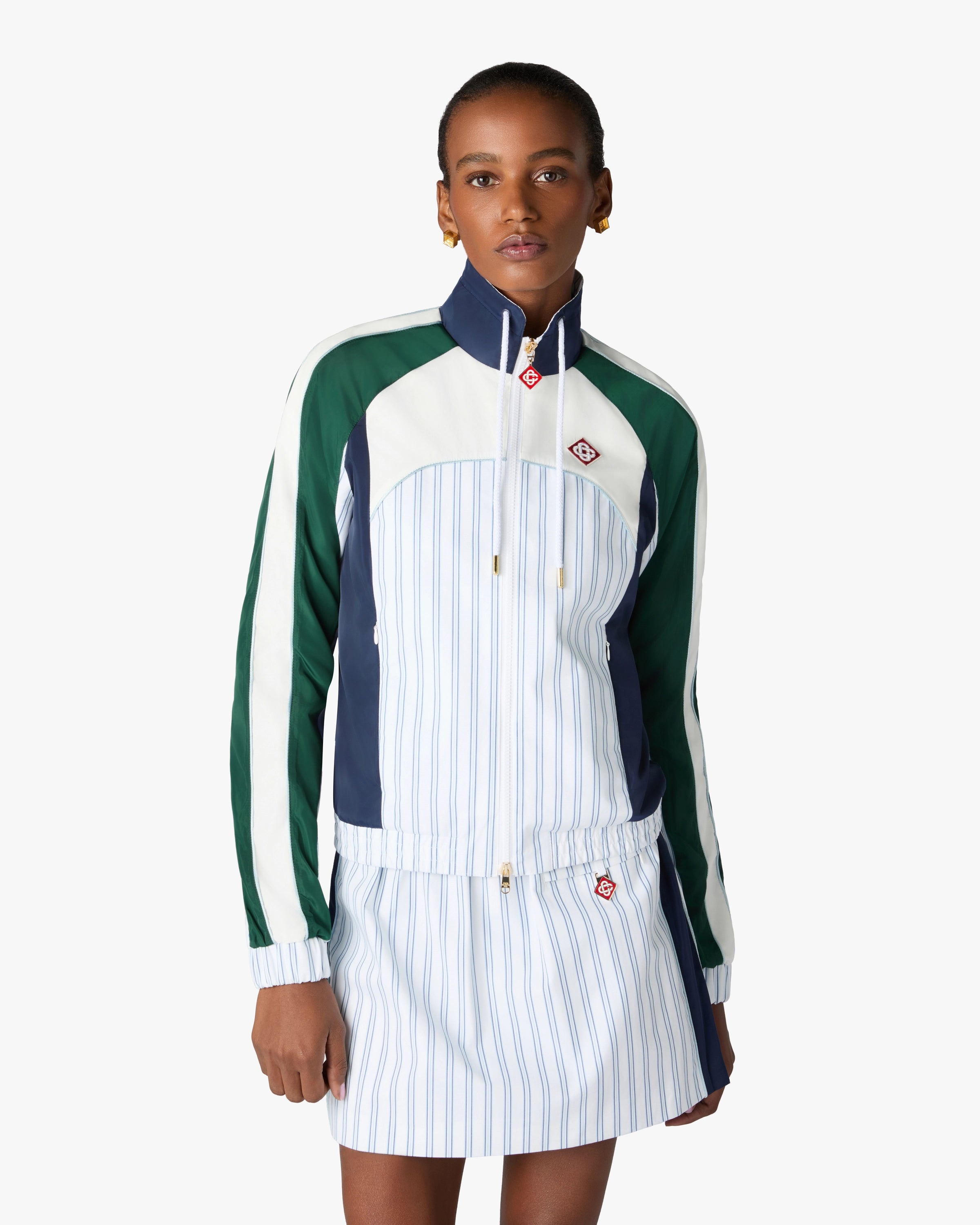 Veste de survêtement à empiècements à fines rayures blanches et bleu marine
