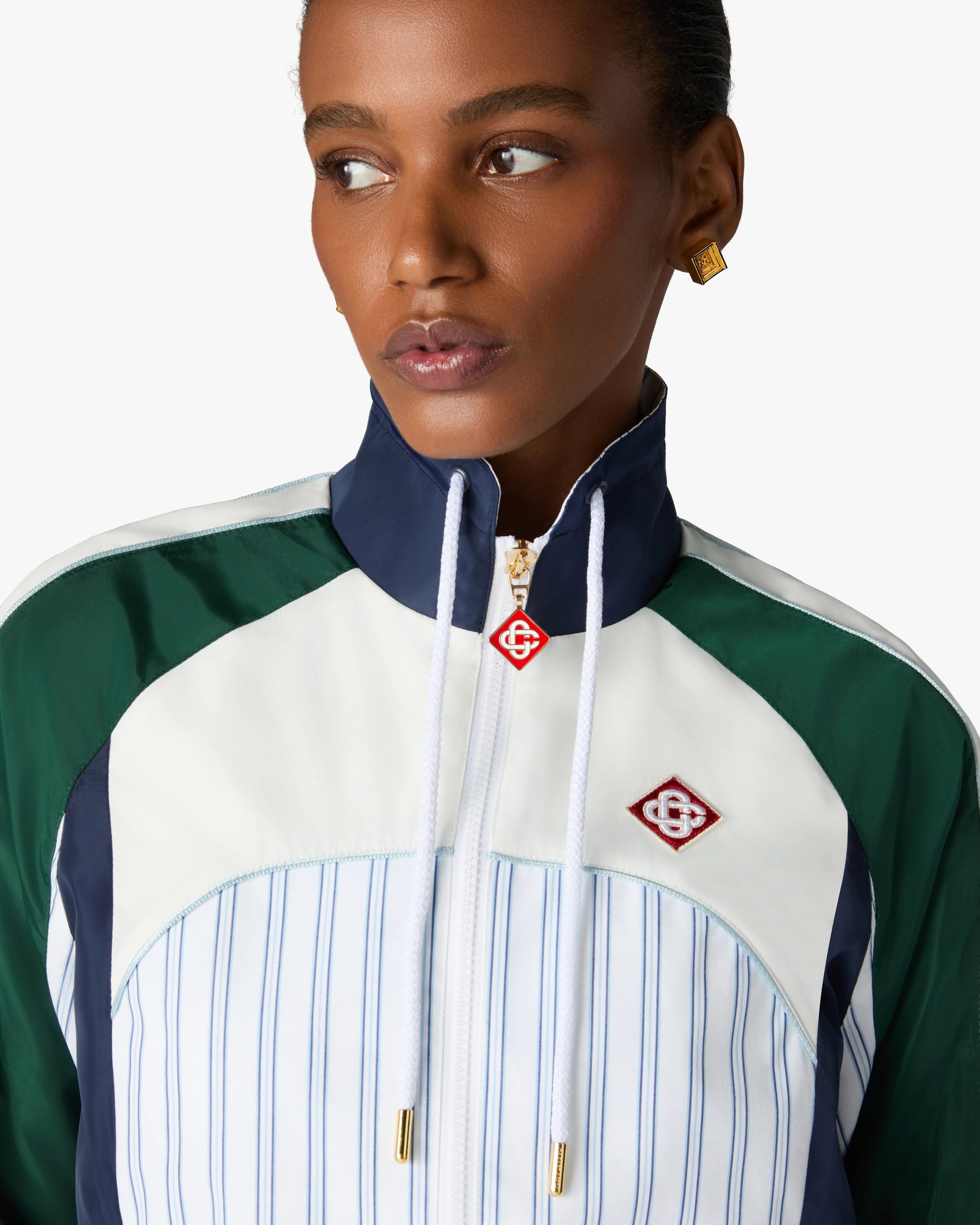 Veste de survêtement à empiècements à fines rayures blanches et bleu marine