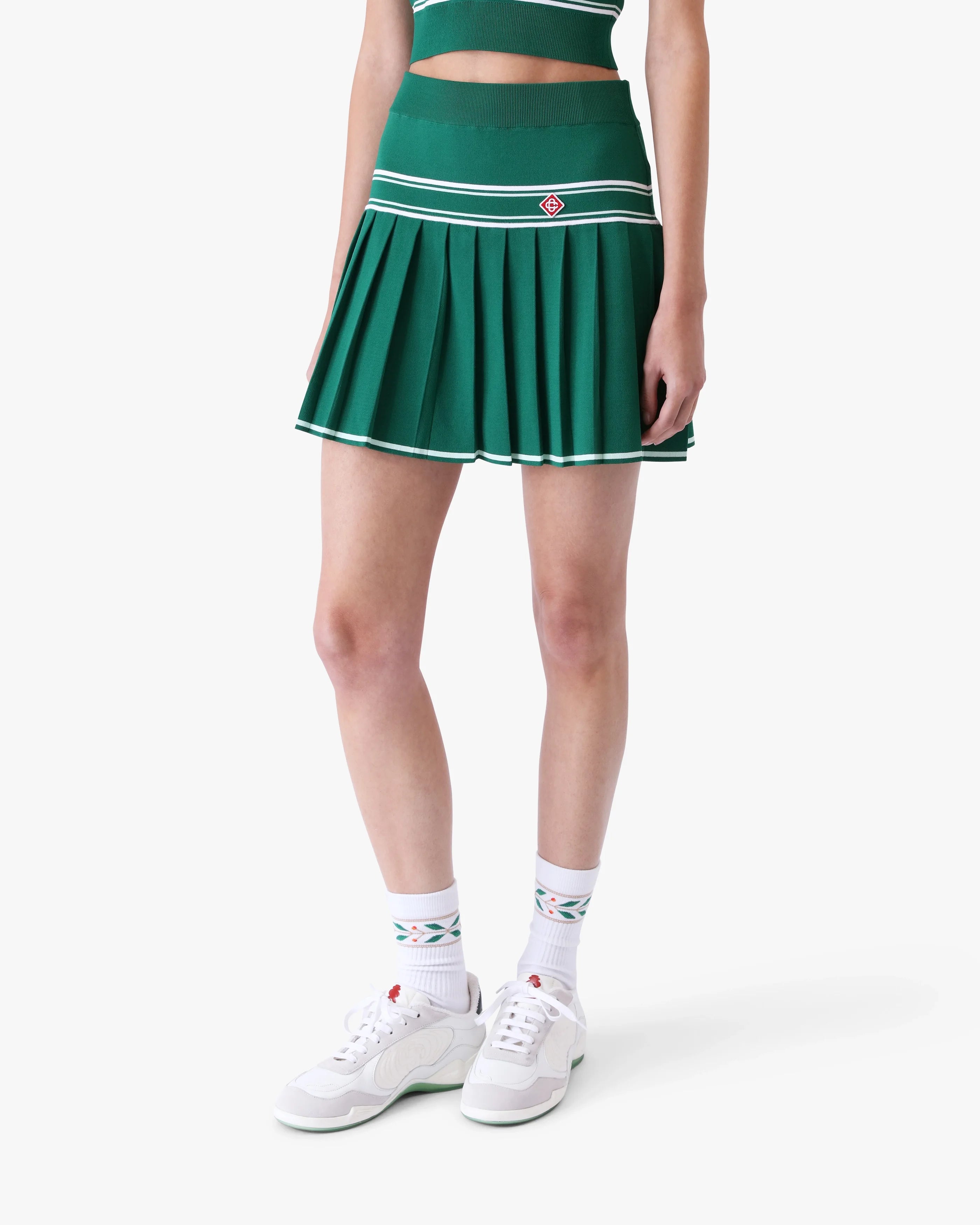 Mini-jupe verte en maille plissée