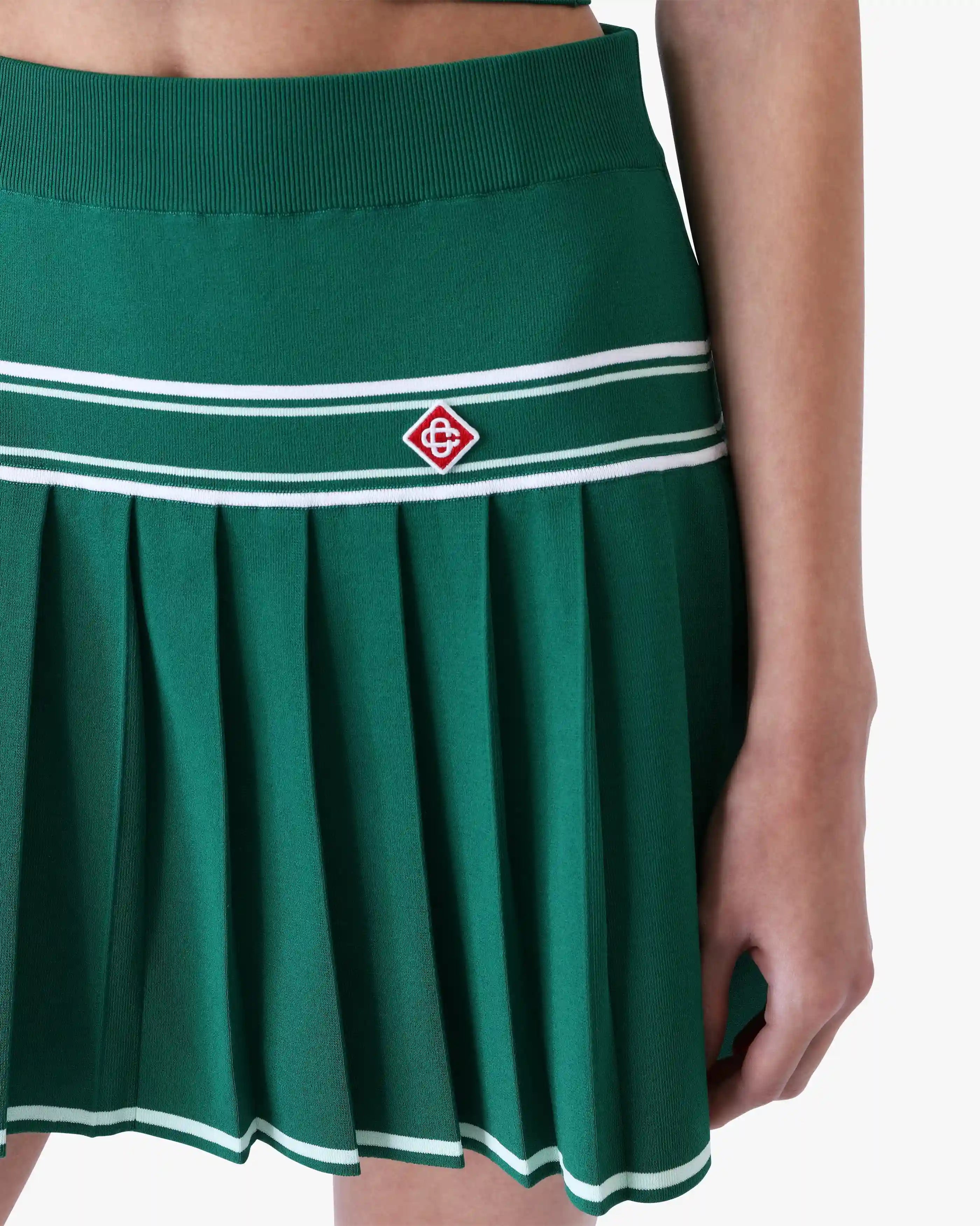 Mini-jupe verte en maille plissée