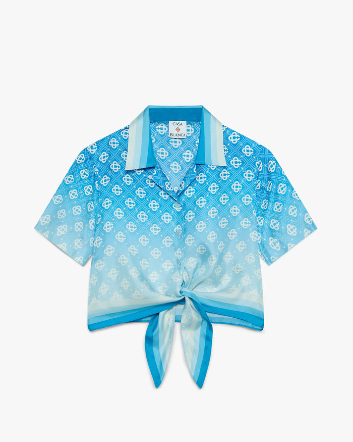 Chemise courte en soie bleue à monogramme dégradé et nœud