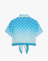 Chemise courte en soie bleue à monogramme dégradé et nœud